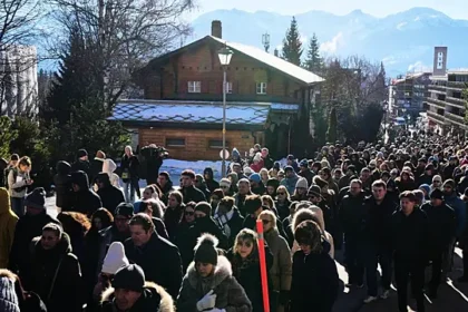 hundreds march in silence to honour victims of swiss bar fire