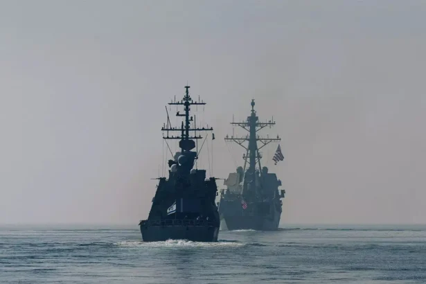 us aircraft carrier shoots down iranian drone in arabian sea amid rising tensions