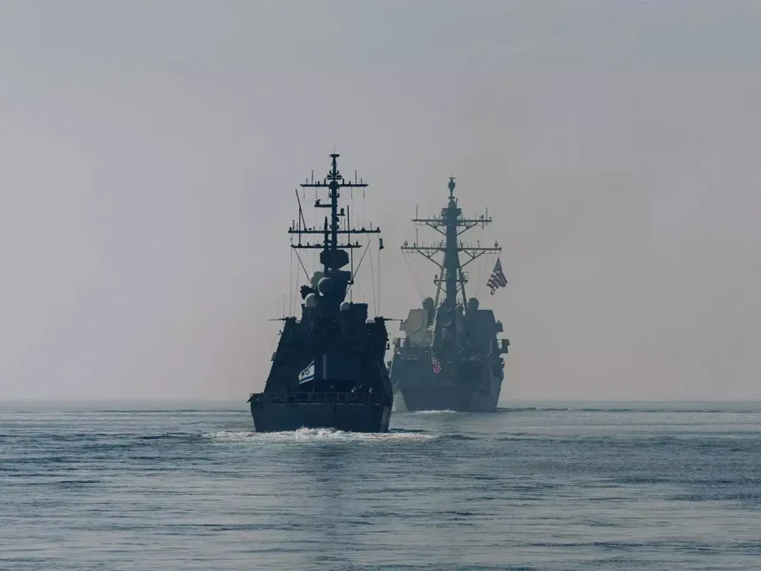 us aircraft carrier shoots down iranian drone in arabian sea amid rising tensions