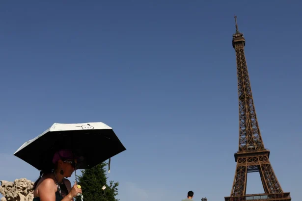 people cool off in the trocadero fountain in front of the eiffel tower as temperatures rise in paris 244851794 1x1 1